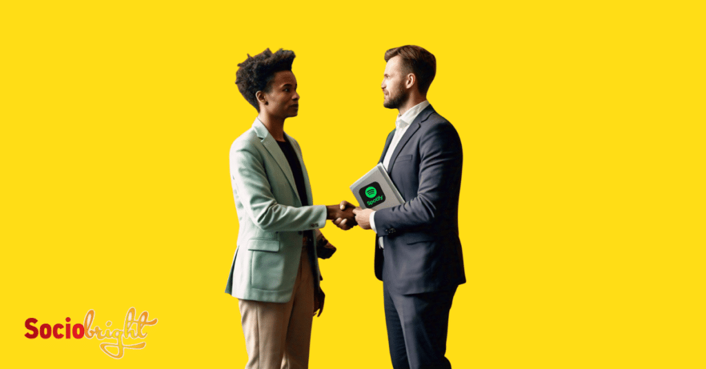 a person shaking hands with a representative from a top Spotify advertising agency.